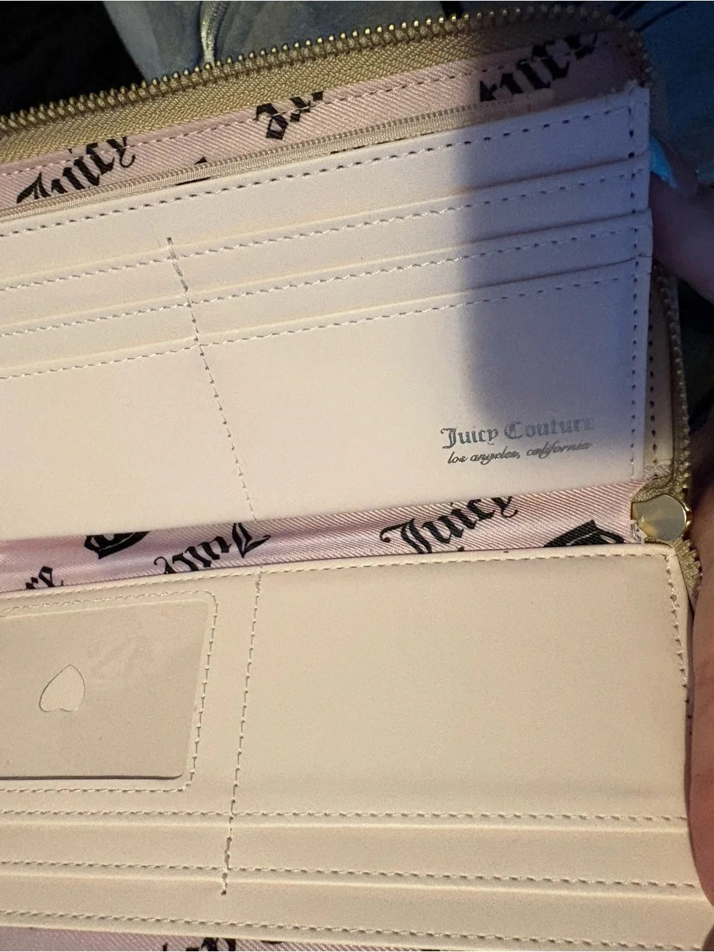 Juicy Couture cream zip